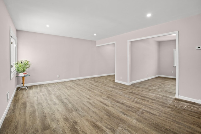 empty room featuring hardwood / wood-style flooring