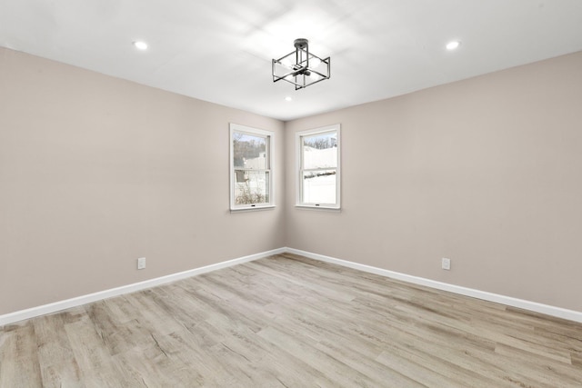 unfurnished room featuring light wood-type flooring