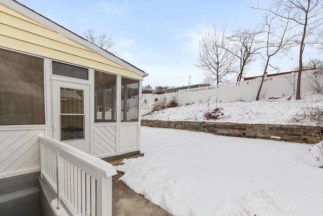 view of yard covered in snow