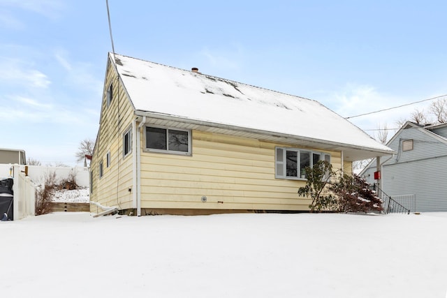 view of snow covered property