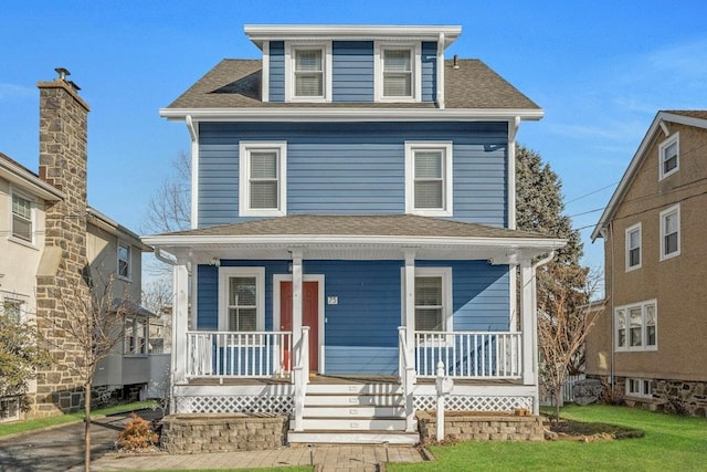 front facade featuring covered porch