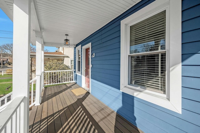 wooden terrace with covered porch