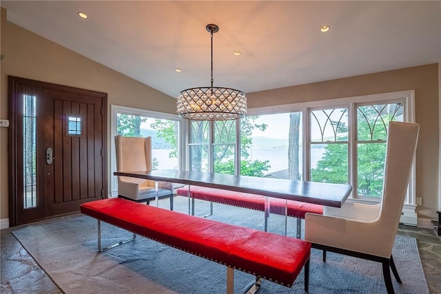 recreation room with lofted ceiling and a wealth of natural light