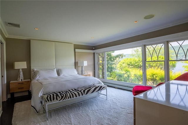 bedroom with ornamental molding