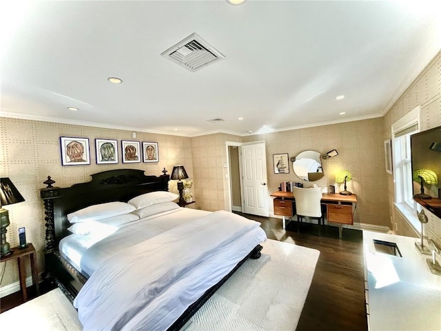 bedroom with dark hardwood / wood-style flooring and ornamental molding