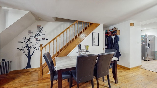 dining room with light hardwood / wood-style flooring