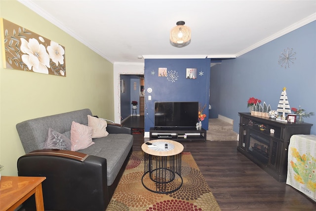 living room featuring dark wood-type flooring and ornamental molding