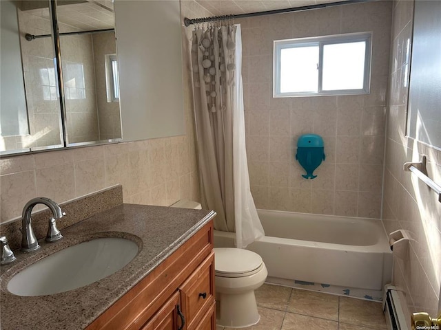 full bathroom featuring shower / bath combo, tile patterned flooring, toilet, baseboard heating, and tile walls