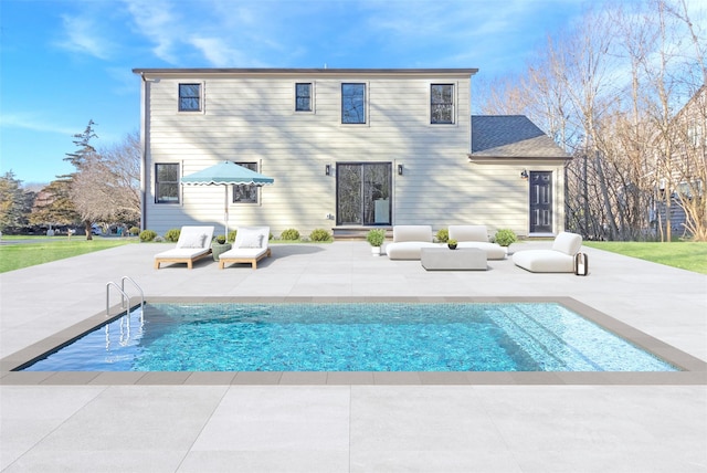 rear view of property with a patio