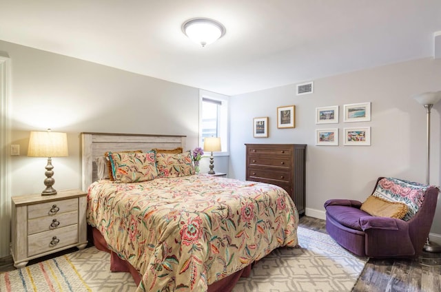 bedroom featuring wood-type flooring