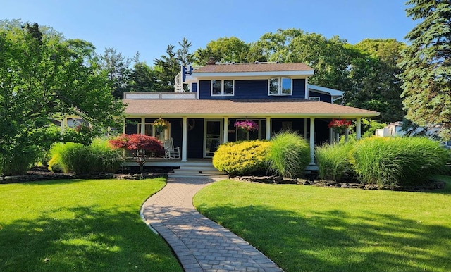 view of front of house featuring a front lawn and a porch