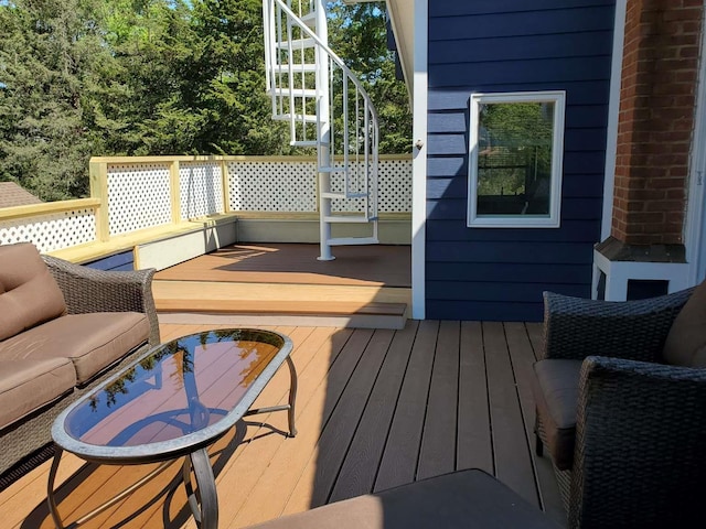 deck featuring an outdoor living space