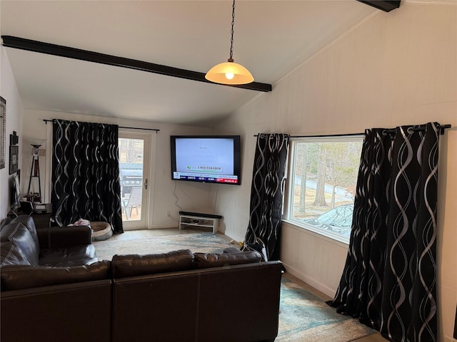 living room featuring vaulted ceiling with beams