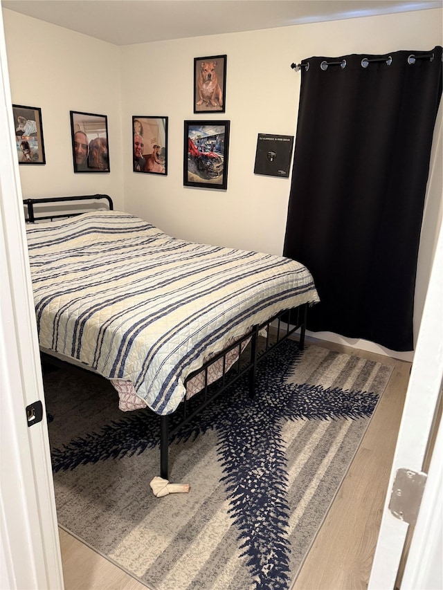 bedroom featuring light hardwood / wood-style flooring