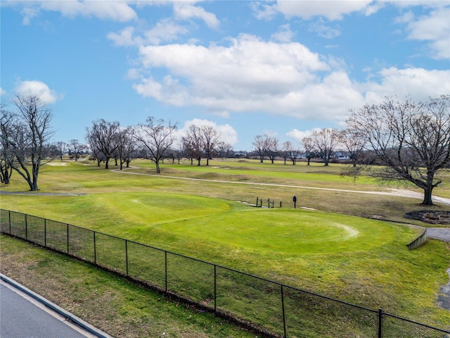 surrounding community with a yard