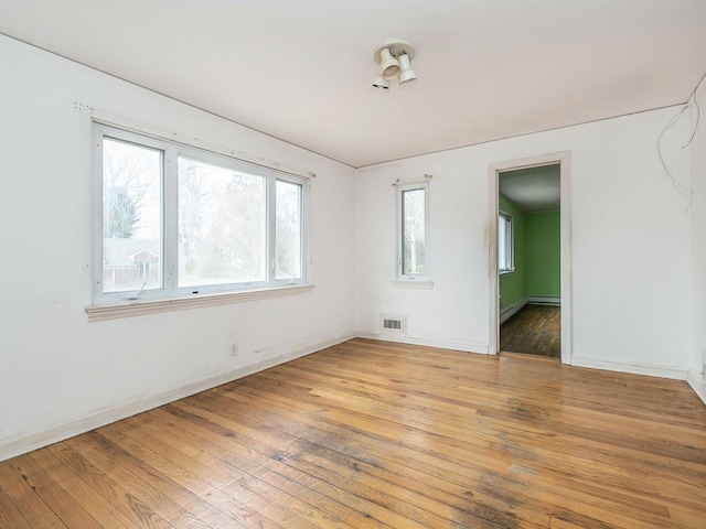 empty room featuring light hardwood / wood-style flooring