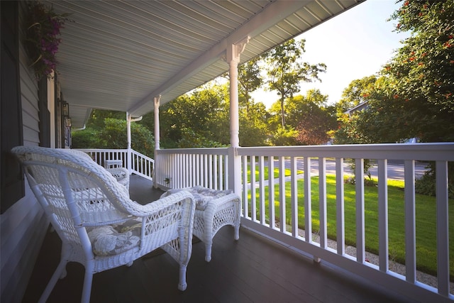 balcony featuring a porch