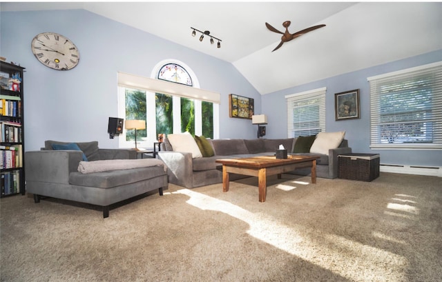 living room featuring ceiling fan, carpet, a baseboard heating unit, and vaulted ceiling