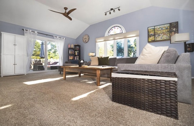 sitting room featuring carpet floors, ceiling fan, and vaulted ceiling