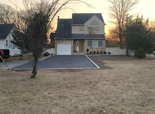 view of front of property with a yard