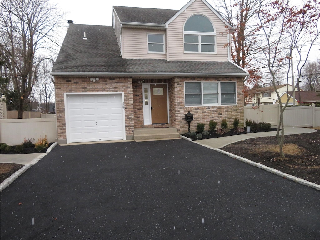 view of front of house with a garage