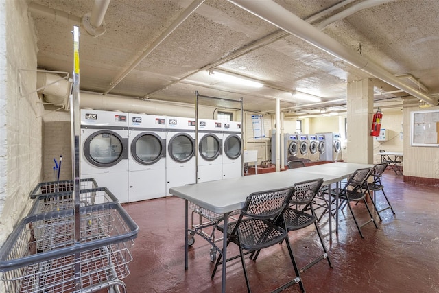 washroom featuring washer and dryer