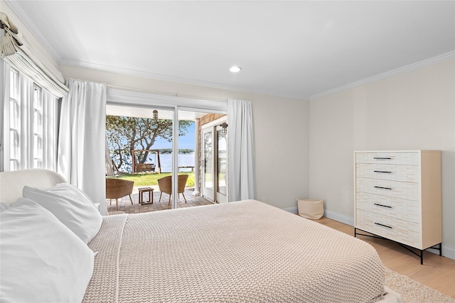 bedroom featuring access to outside, light hardwood / wood-style flooring, and ornamental molding