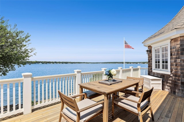 deck featuring a water view