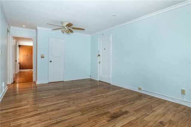 spare room featuring ornamental molding, ceiling fan, and hardwood / wood-style floors