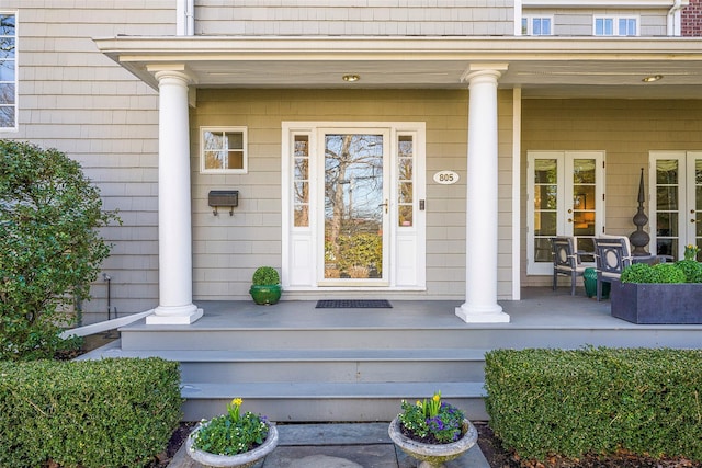 entrance to property featuring a porch