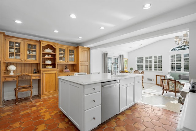 kitchen with recessed lighting, light countertops, stainless steel dishwasher, vaulted ceiling, and a sink