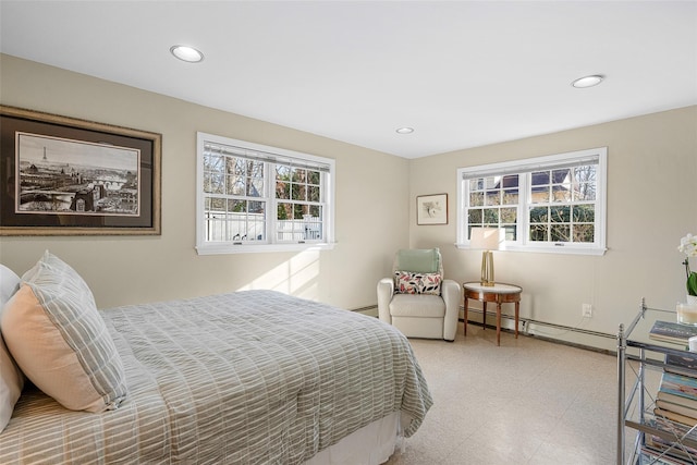 bedroom with recessed lighting, a baseboard radiator, and tile patterned floors