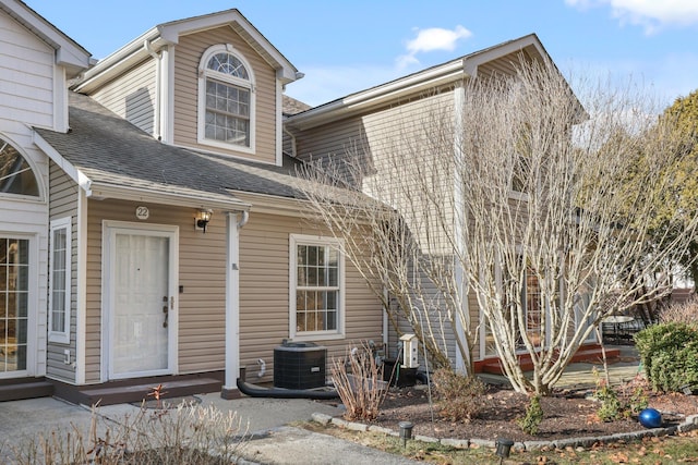 view of front of property featuring central AC unit