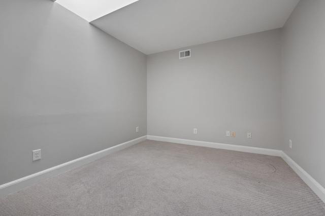 spare room with carpet floors