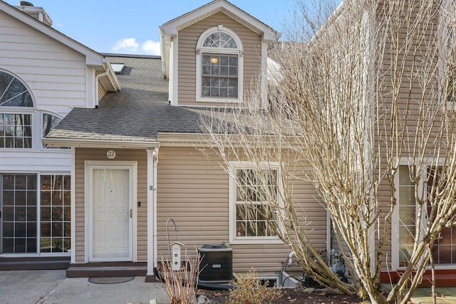 entrance to property with central AC unit