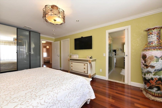 bedroom with crown molding and dark wood-type flooring