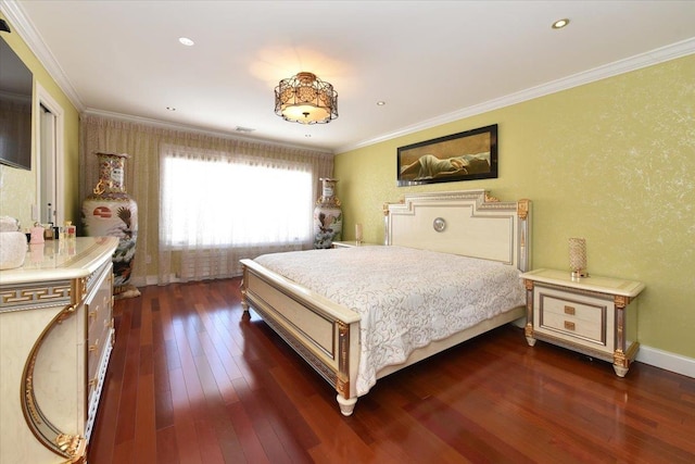 bedroom featuring ornamental molding and dark hardwood / wood-style floors