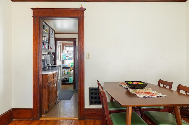 dining area featuring hardwood / wood-style floors