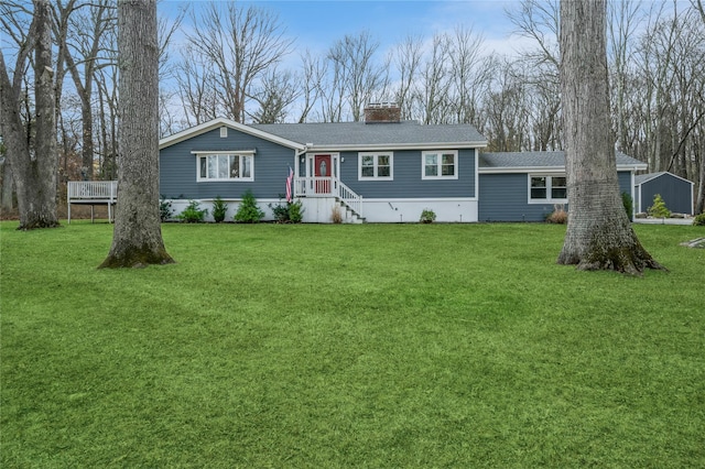 view of front facade featuring a trampoline and a front lawn