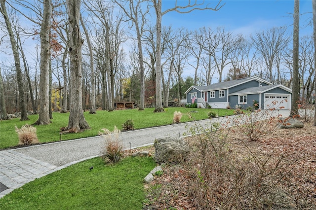 view of yard featuring a garage