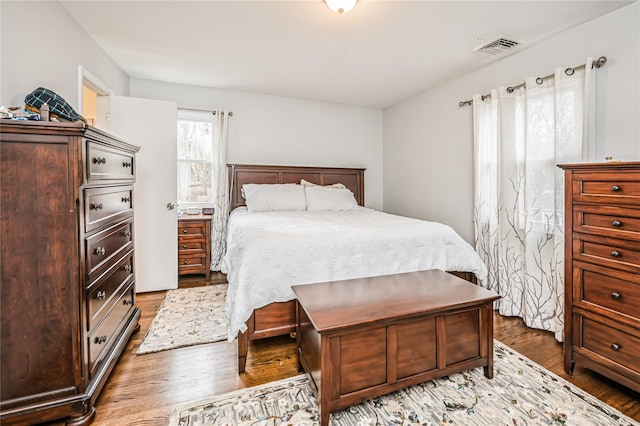 bedroom featuring dark wood-type flooring