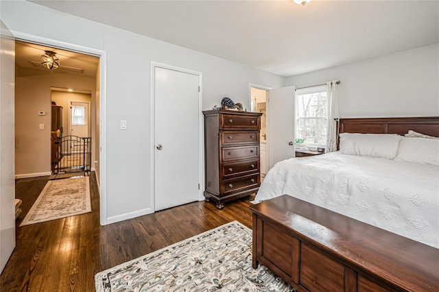 bedroom featuring dark hardwood / wood-style flooring