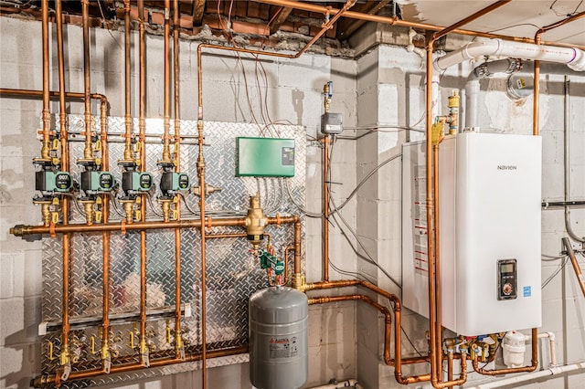 utility room featuring tankless water heater