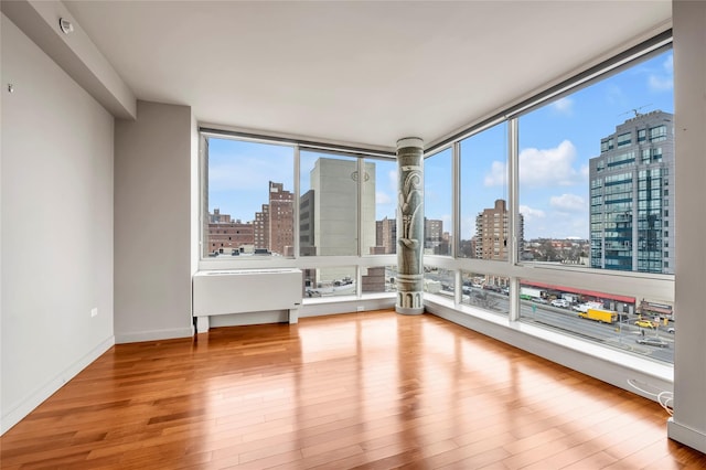 unfurnished sunroom featuring a healthy amount of sunlight