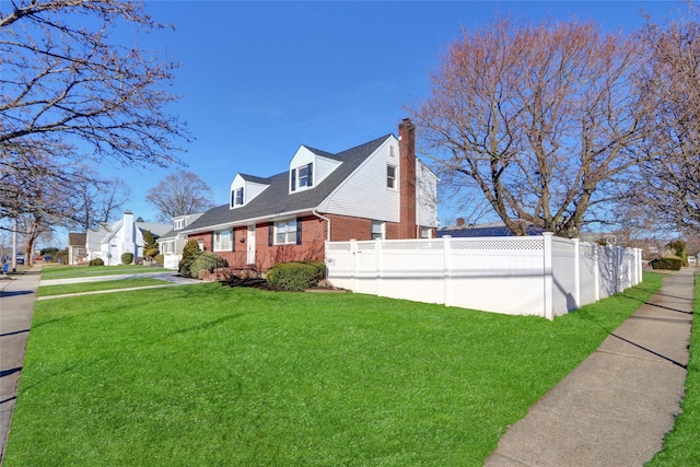 view of property exterior featuring a yard