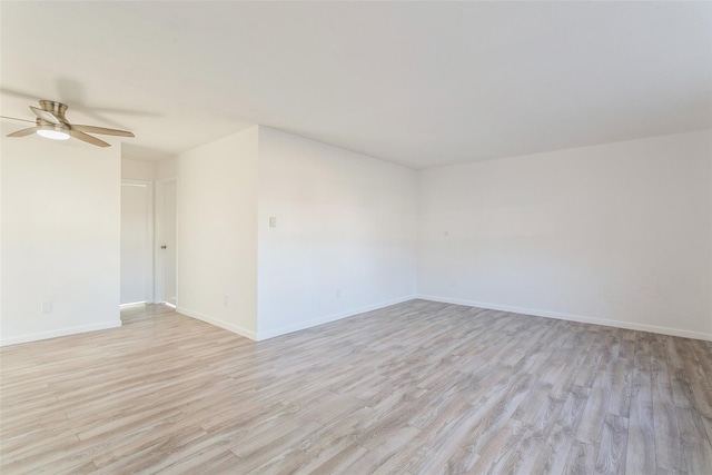 unfurnished room with ceiling fan and light hardwood / wood-style flooring