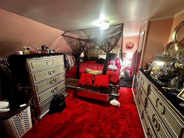 bedroom featuring carpet flooring and crown molding