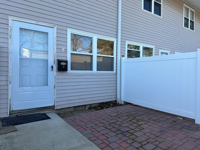 doorway to property featuring a patio