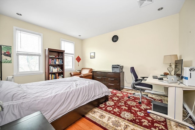 bedroom featuring light hardwood / wood-style floors