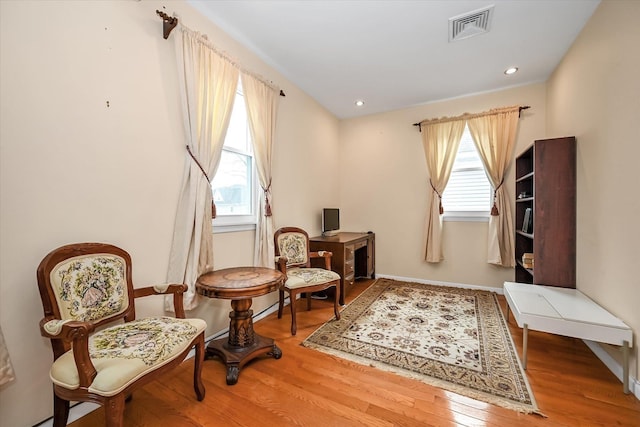 sitting room featuring hardwood / wood-style flooring